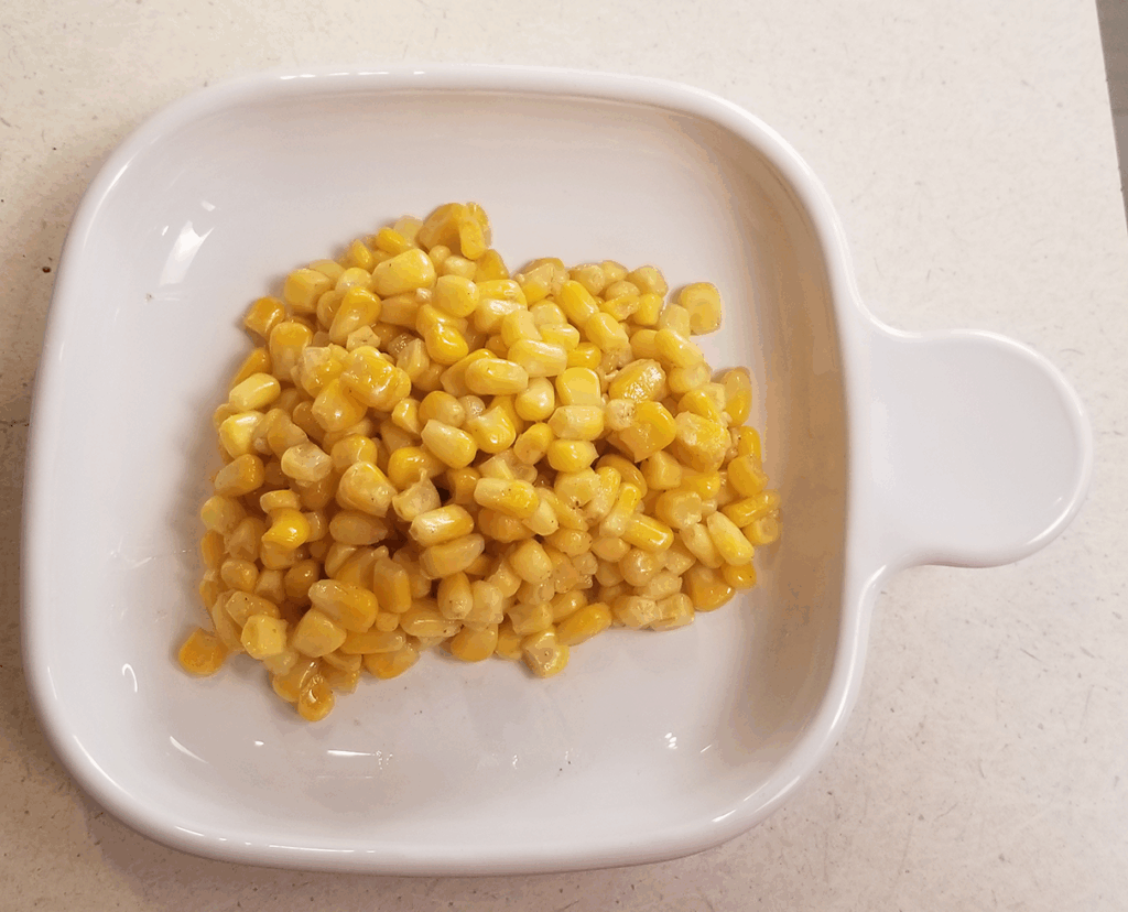 brown butter corn on a plate