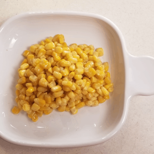 brown butter corn on a plate